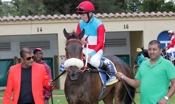 Alesh Naidoo and Mayesh Chetty leading in Admiral's Eye from her last win at Scottsville on 14 January 2014. Image: Gold Circle