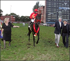 Joyce and Robin Scott lead in The Apache after his 2011 Grade 1 Champions Cup win with trainer Gavin Van Zyl. Image: Gold Circle