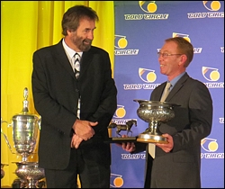 Paul Lafferty handing over the award for Ashburton Trainer Of The Year to Duncan Howells. Image: Ashley De Klerk